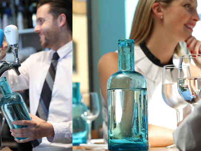 a waiter pouring water
